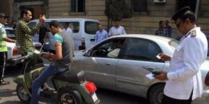 حملات مرورية مكثفة بالقاهرة والجيزة لضبط المخالفات ورفع السيارات المتروكة :اليوم السابع